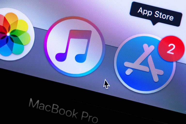 Apple Macbook with App Store and iTunes icons app on the screen